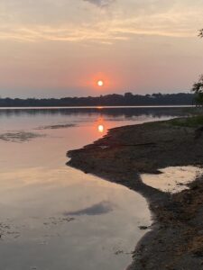 Photo of a sunrise over a lake