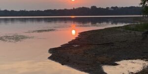 Photo of a sunrise over a lake