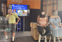 Cocreating a World Alliance president Terry Gips, intern Abigail Mathew, and board member Toya Lopez present at the Minnesota State Fair.